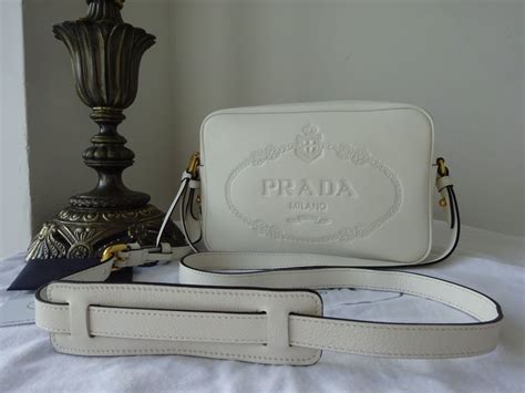 white prada camera bag